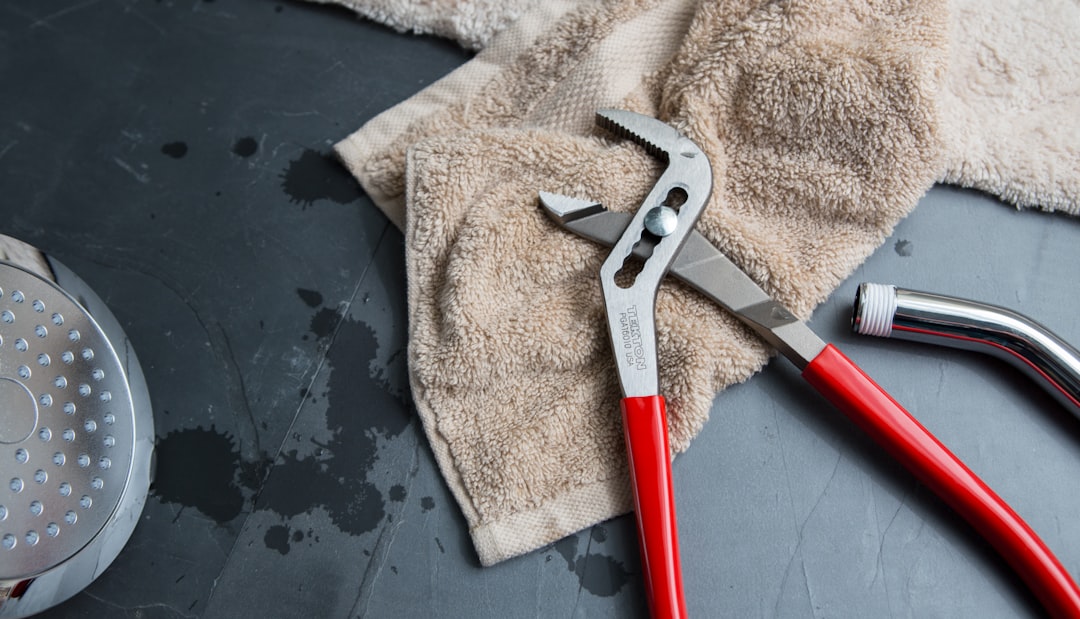 Professional plumber servicing a home in Colwood BC