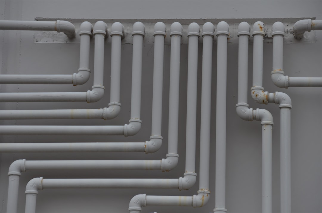 Licensed plumber replacing polybutylene pipe in a Victoria BC home